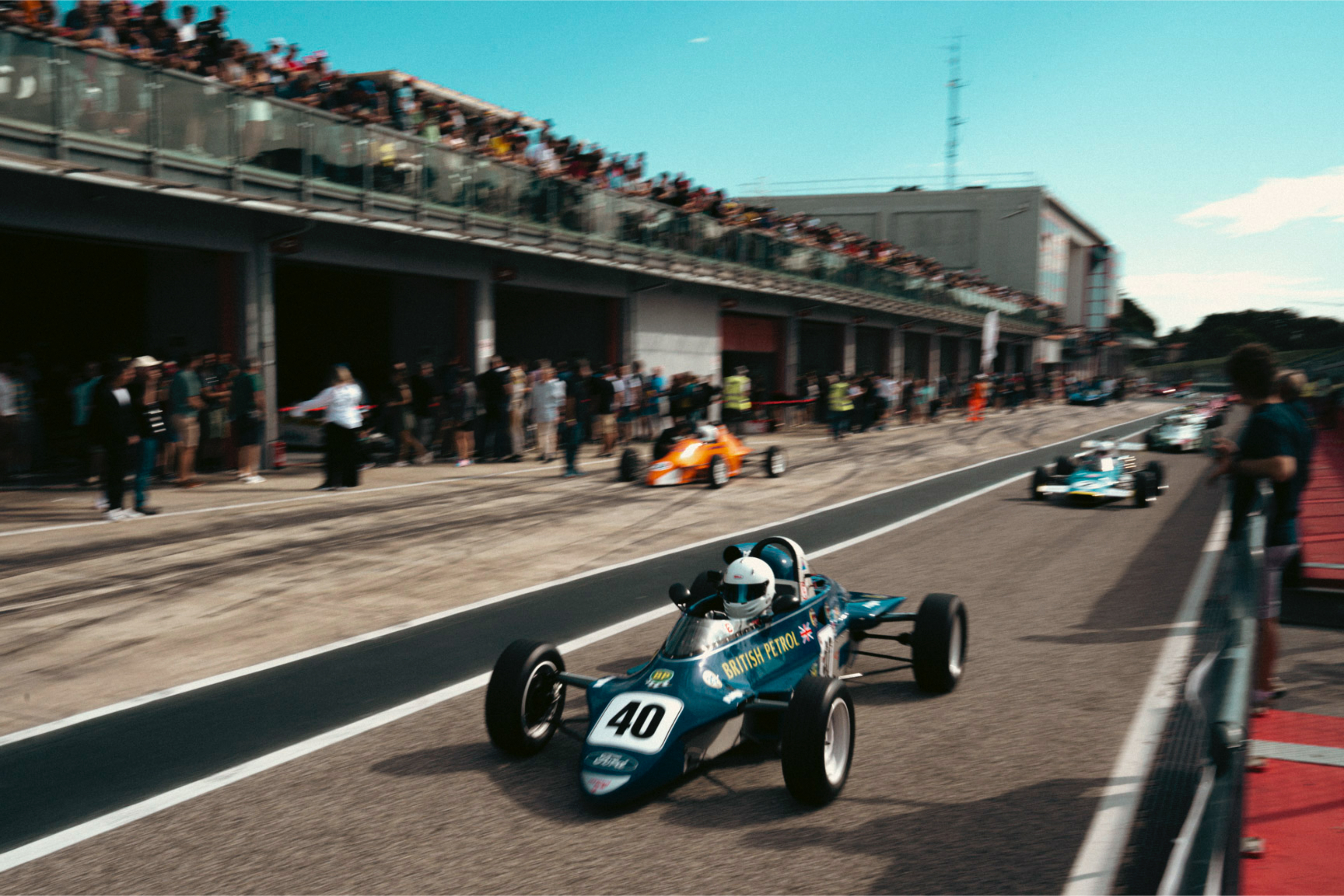 Imola paddock atmosphere at Minardi Day 2023, heritage motorsport photograph by Simone Slawitz
