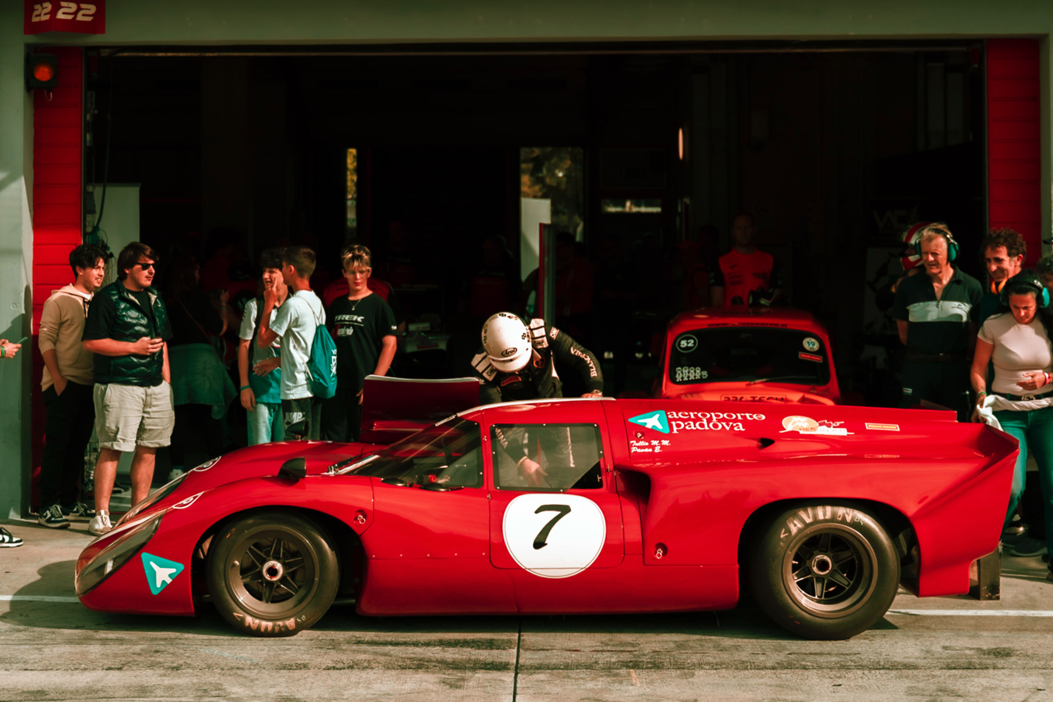 Lola historic racing car in the box at Minardi Day 2025, photograph by Simone Slawitz